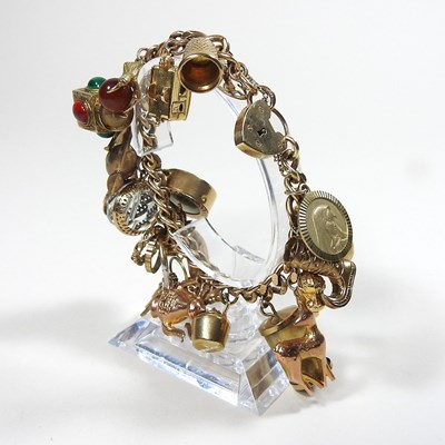 Lot 590 - A charm bracelet