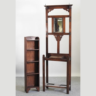 Lot 592 - A 1920's narrow oak dwarf bookcase