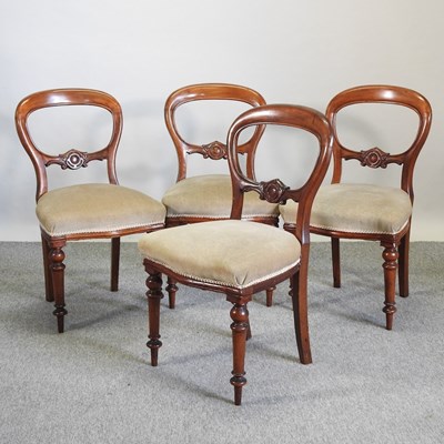 Lot 605 - A set of four Victorian mahogany balloon back dining chairs