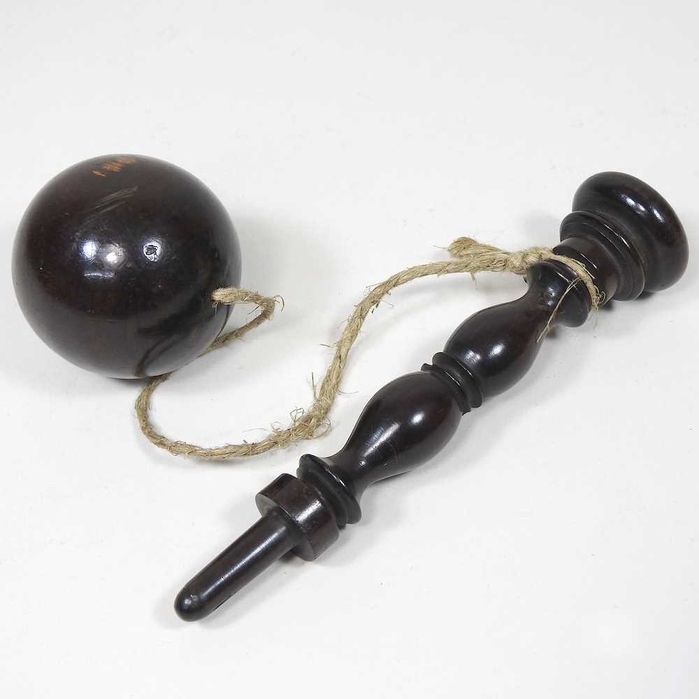 Lot 364 - A treen cup and ball