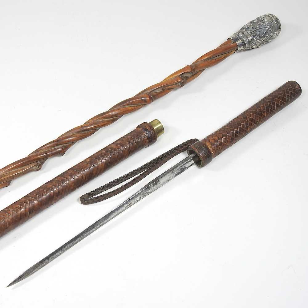 Lot 213 - Walking cane and baton