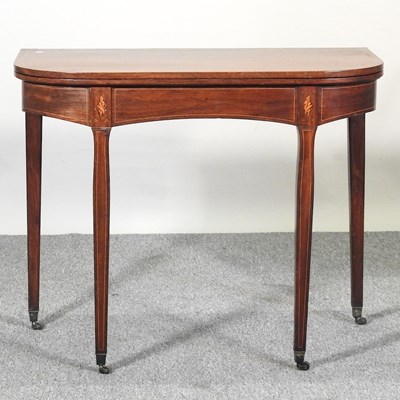 Lot 219 - A tea table