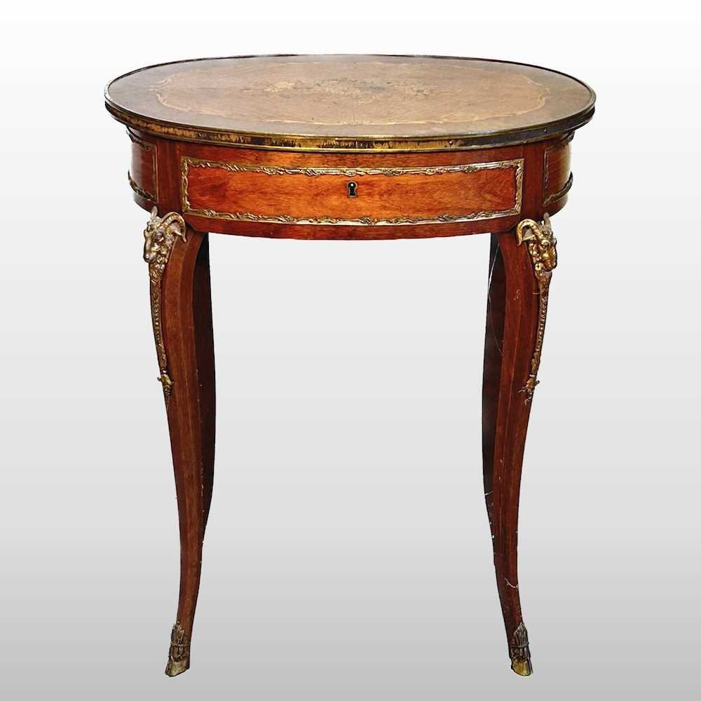 Lot 266 - A French table