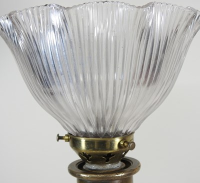 Lot 536 - A brass fireman's hose table lamp