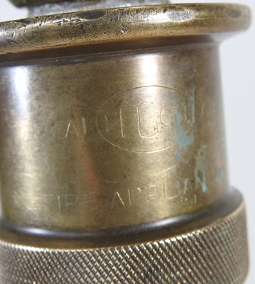 Lot 536 - A brass fireman's hose table lamp