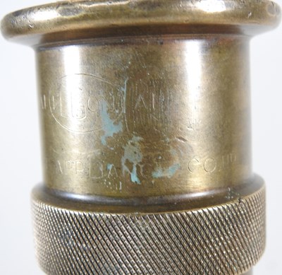 Lot 536 - A brass fireman's hose table lamp