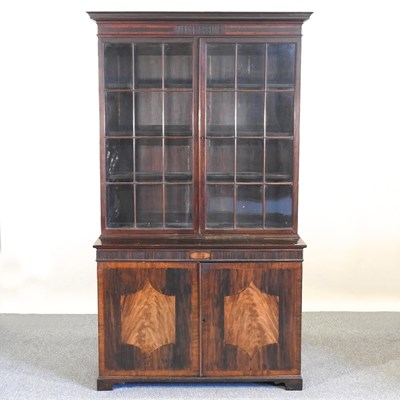 Lot 346 - A bookcase and cabinet