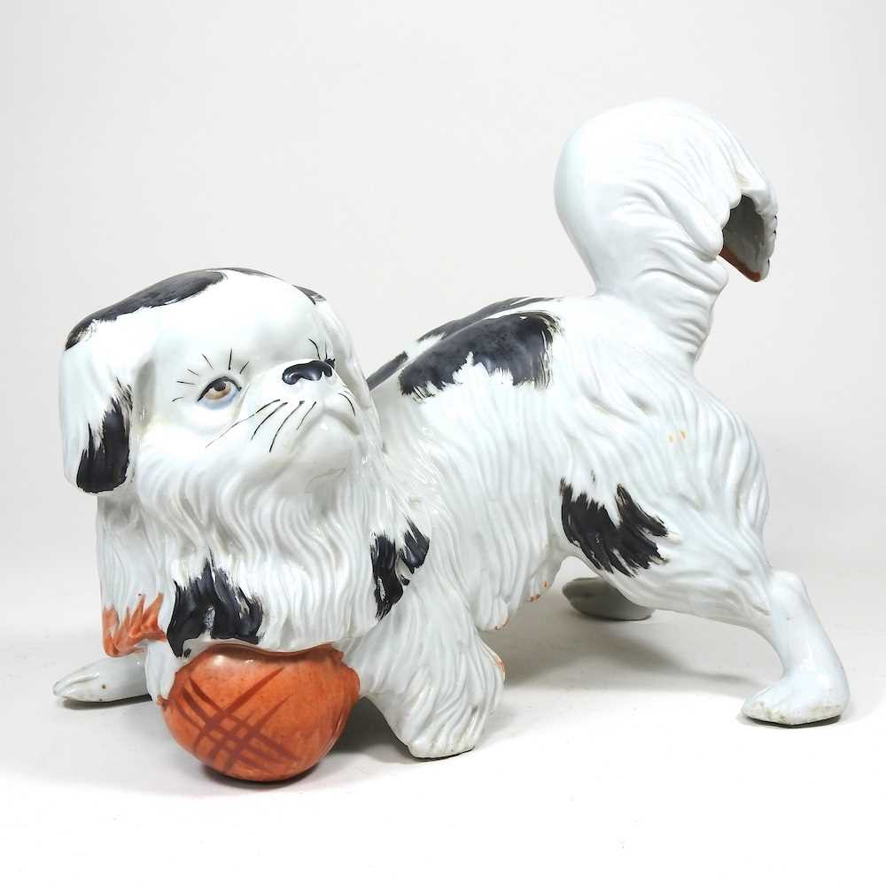 Lot 110 - A Japanese porcelain dog