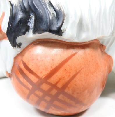 Lot 110 - A Japanese porcelain dog