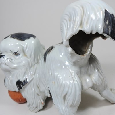 Lot 110 - A Japanese porcelain dog