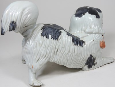 Lot 110 - A Japanese porcelain dog