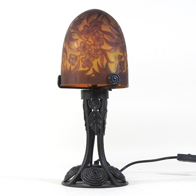 Lot 184 - A Daum style iron table lamp