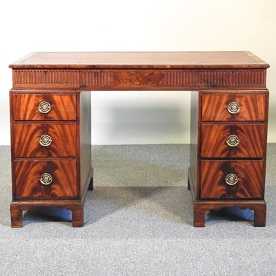 Lot 60 - A pedestal desk