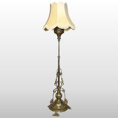 Lot 231 - A brass standard lamp