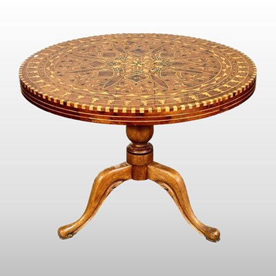 Lot 586 - A fruitwood table