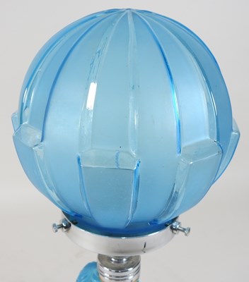 Lot 83 - An Art Deco pressed blue glass table lamp and shade