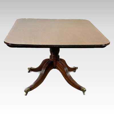 Lot 155 - A dining table