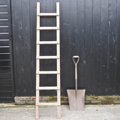 Lot 134 - A ladder and shovel