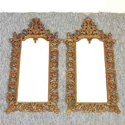 Lot 202 - A pair of ornate 19th century brass framed wall mirrors