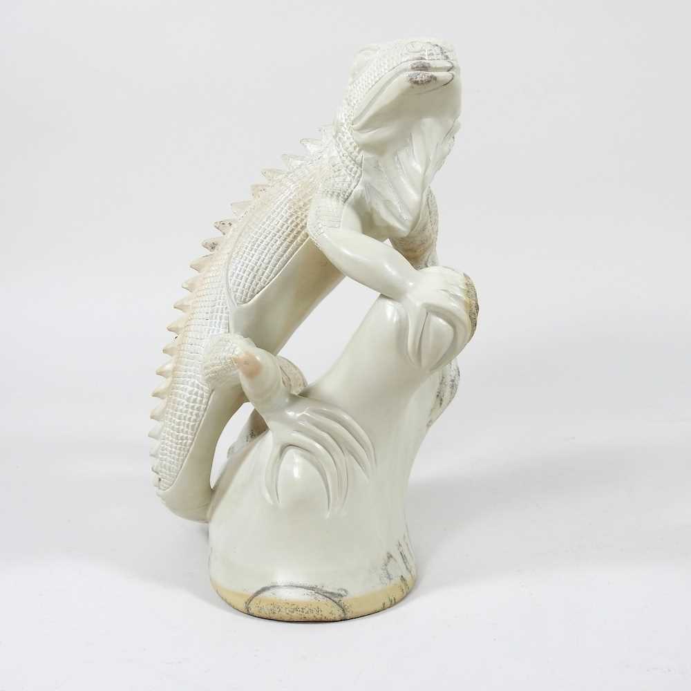 Lot 208 - A stone lizard