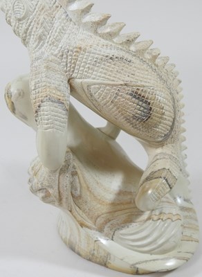 Lot 208 - A stone lizard