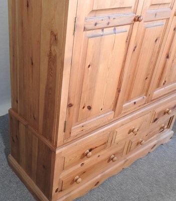 Lot 425 - A pine wardrobe