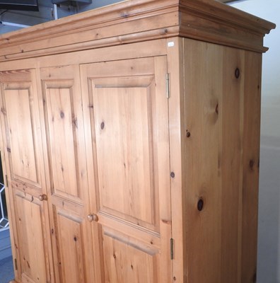 Lot 425 - A pine wardrobe