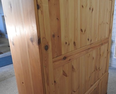 Lot 425 - A pine wardrobe