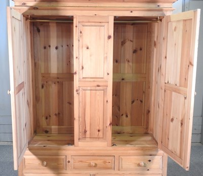 Lot 420 - A pine wardrobe