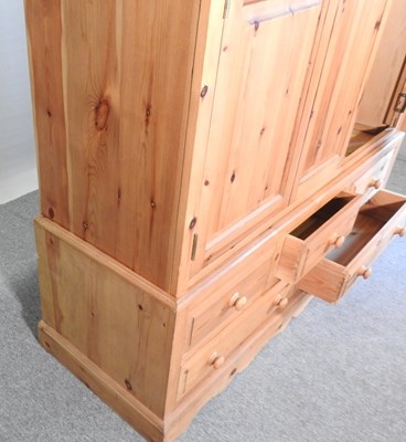 Lot 420 - A pine wardrobe