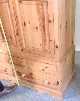 Lot 420 - A pine wardrobe