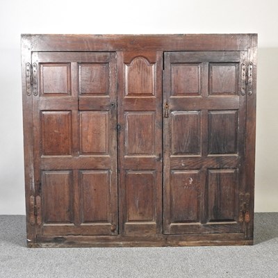 Lot 101 - An oak cupboard