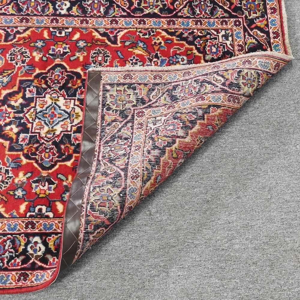 Lot 84 A Persian rug