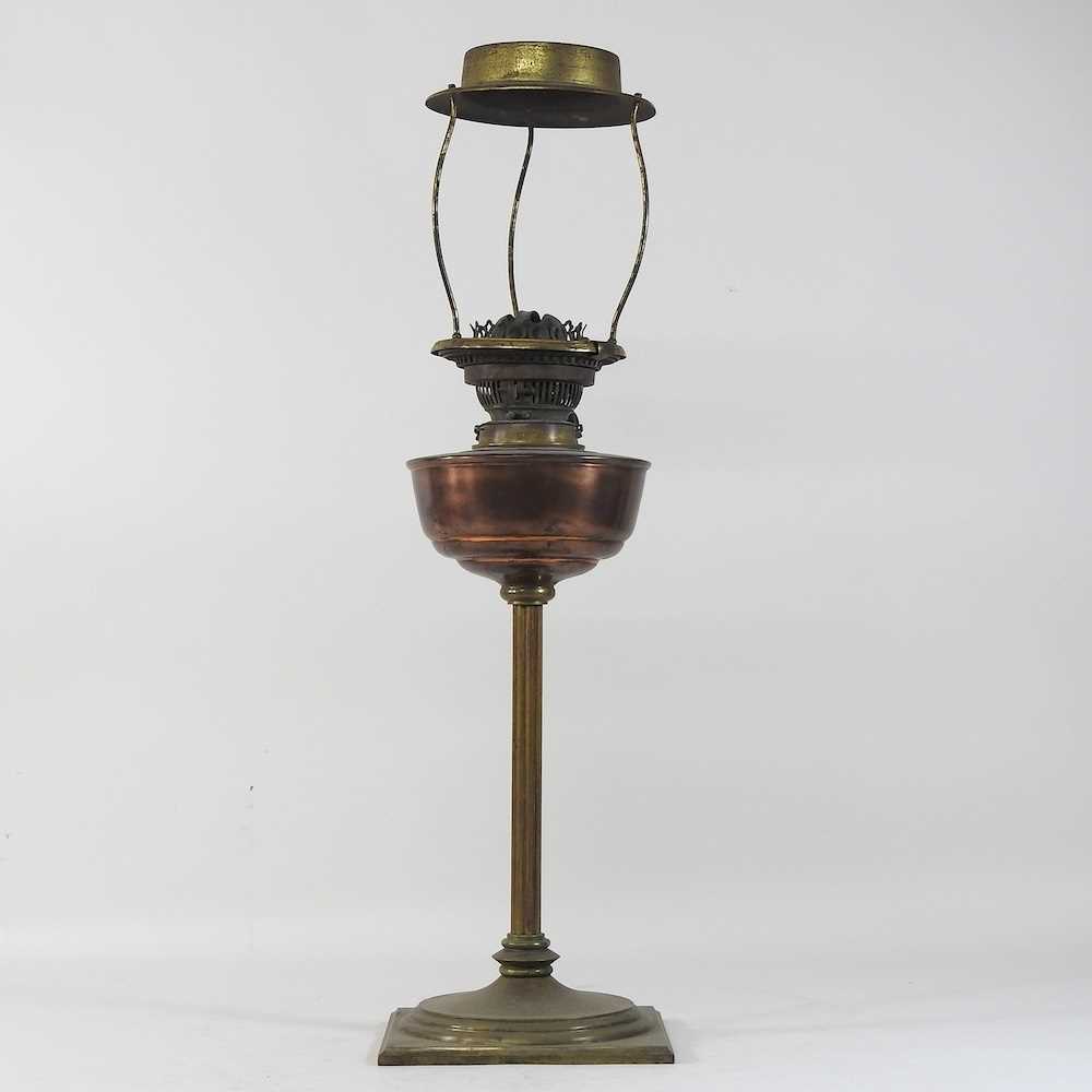 Lot 216 - A 19th century brass oil lamp