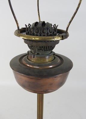 Lot 216 - A 19th century brass oil lamp