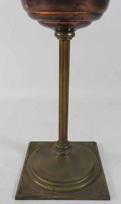 Lot 216 - A 19th century brass oil lamp