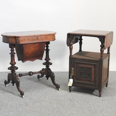 Lot 146 - A work table and cabinet