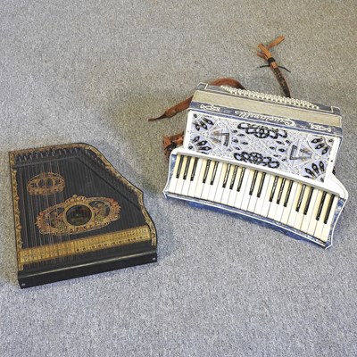 Lot 346 - A zither and accordion