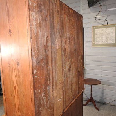 Lot 72 - An antique pine glazed cabinet