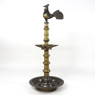 Lot 105 - An Eastern candlestick