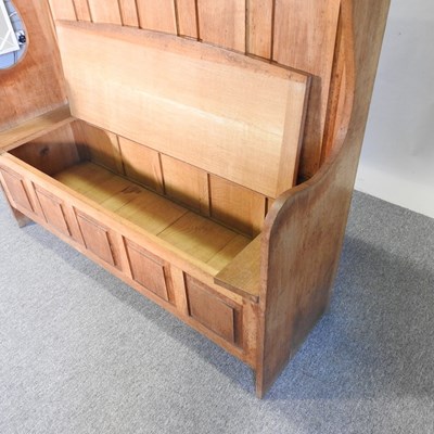 Lot 63 - An oak settle