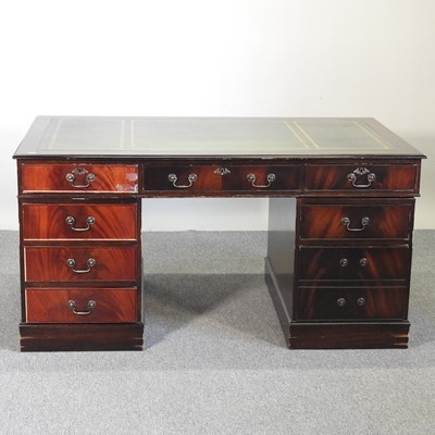 Lot 37 - A pedestal desk