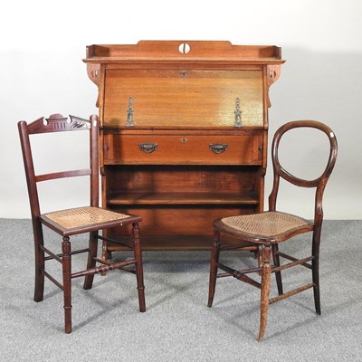 Lot 194 - A bureau and chairs