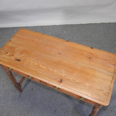 Lot 75 - An antique pine side table