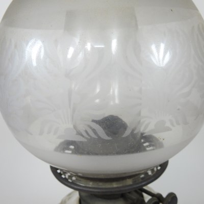 Lot 412 - A cut glass oil lamp