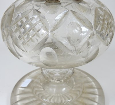 Lot 412 - A cut glass oil lamp