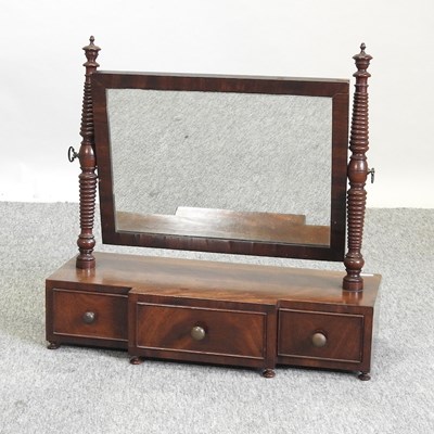 Lot 302 - A Regency mahogany swing framed toiletry mirror