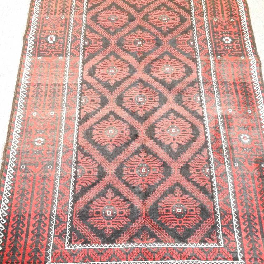 Lot 153 A Persian rug
