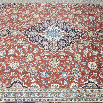 Lot 140 - A large Persian carpet