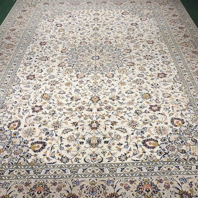 Lot 131 - A Kashan carpet